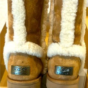 Ugg chestnut color boots size 8. Some wear you can see in pictures.